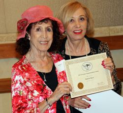 Patricia Myers receiving 5 awards