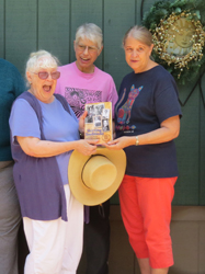 Pam Stevenson presenting Betty Merritt with Skirting Traditions